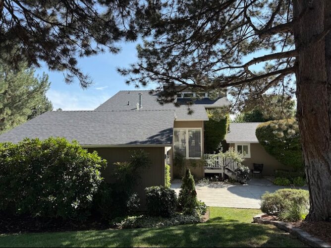 a home with an asphalt shingle roof